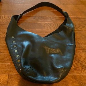 Hammitt black pebbled leather hobo bag.